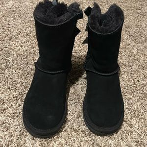 Girls black Ugg Bailey boots with beautiful satin bows on the back